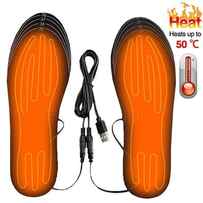 A pair of USB heated insoles with a USB cable, designed to fit into shoes and provide warmth. The insoles are orange with a pattern showing where the heat is distributed, and the temperature is capped at 50°C.